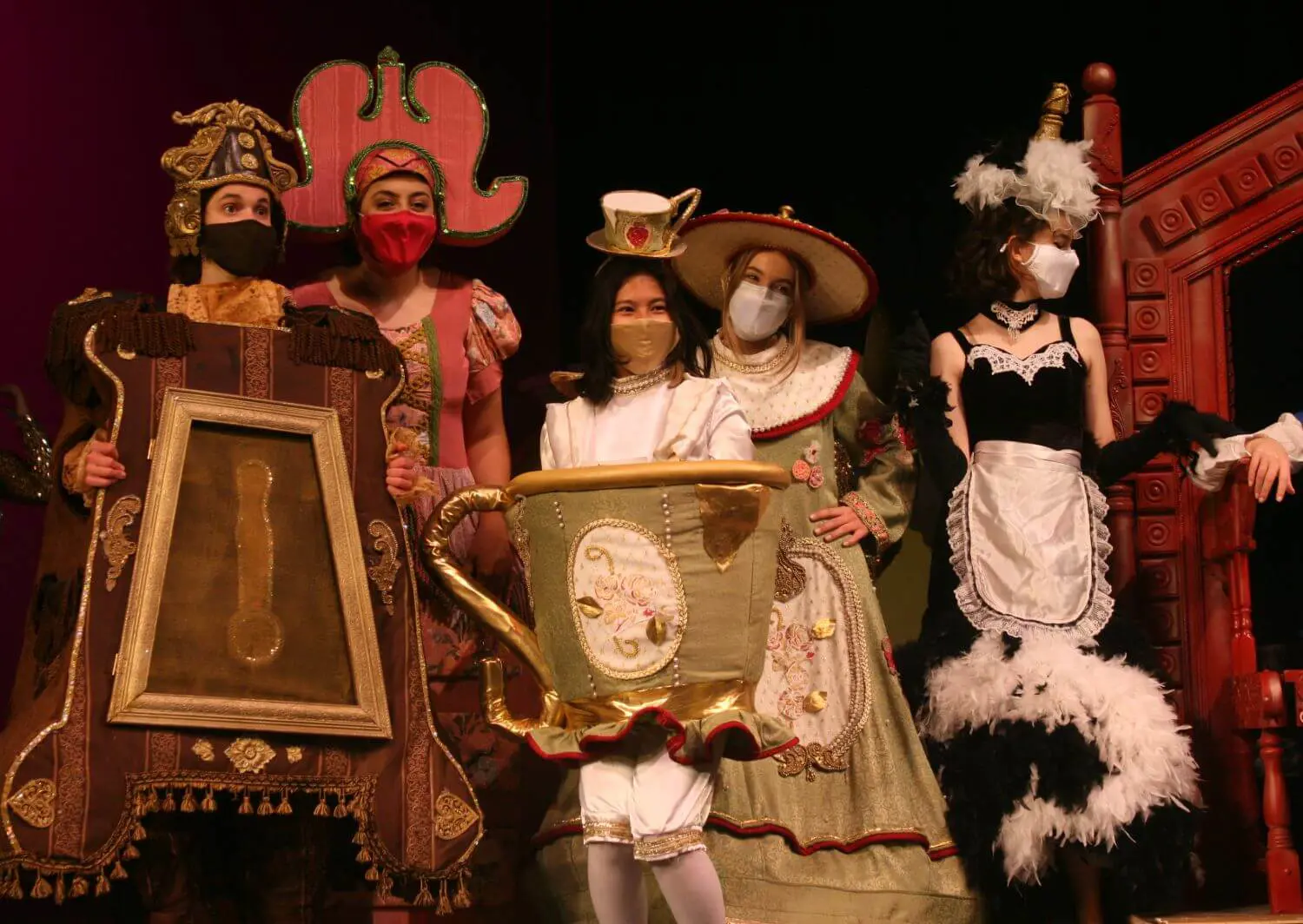 Sarah Vorrath ‘22, Yasmine Bari ‘21, Graciella Butler ‘21, and Gabriella Federighi ‘22 invite the audience in to “be their guests” in Beauty and the Beast Jr.