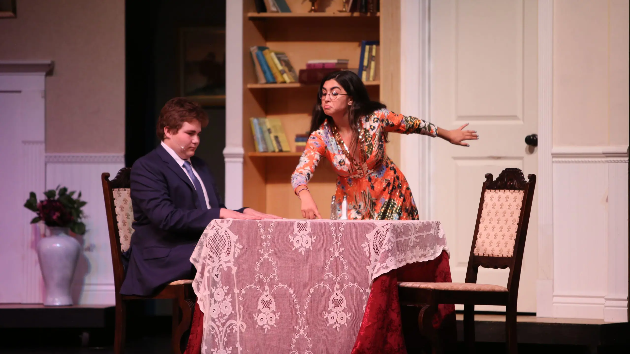 Jack Whitlow ‘21 and Valentina Paredes ‘21 prepare for a seance in Noël Coward’s hilarious farce Blithe Spirit. The two performed as Charles Condomine and Madame Arcati in 2019’s Fall Play.